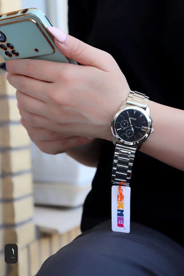 ساعت زنانه اسکیمی اصل رنگ ثابت ضدآب فول تایم همراه با جعبه اورجینال شرکتی