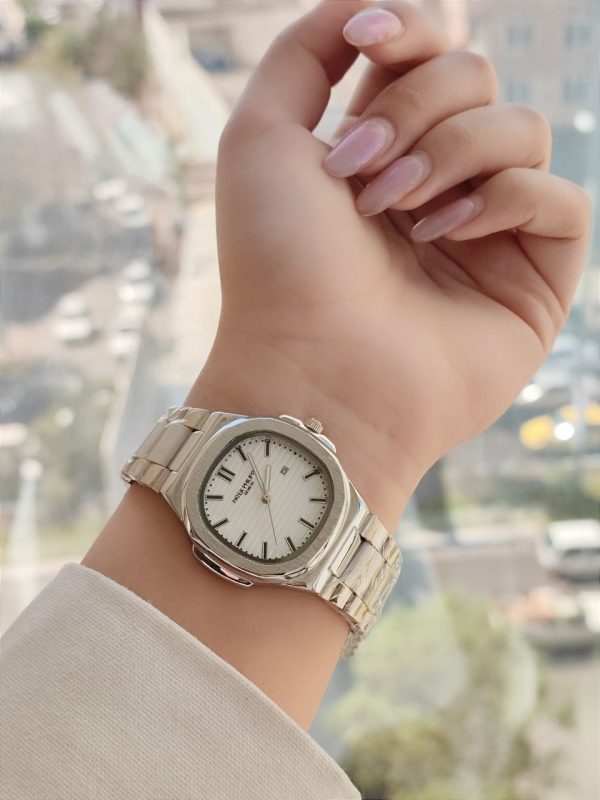 ساعت زنانه پتک فلیپ رنگ ثابت دارای تقویم و قفل ضامن دار استیل با کیفیت