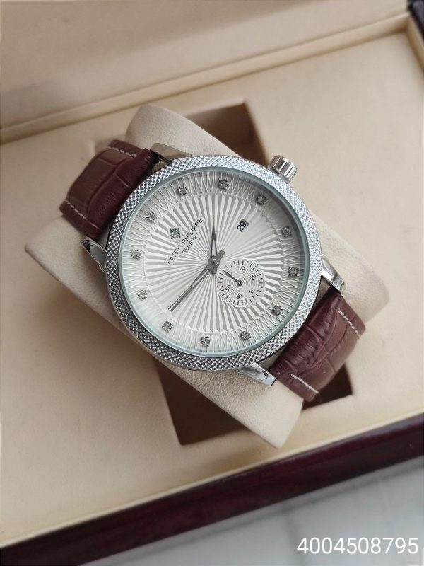 ساعت مردانه چرمی پتک فلیپ موتور ژاپن تقویم دار رنگ ثابت کیفیت عالی دارای رنگ بندی متنوع چرم با کیفیت